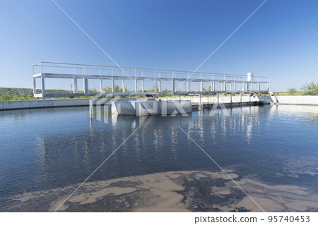 View to sewage treatment plant - water recycling. Waste management. 95740453