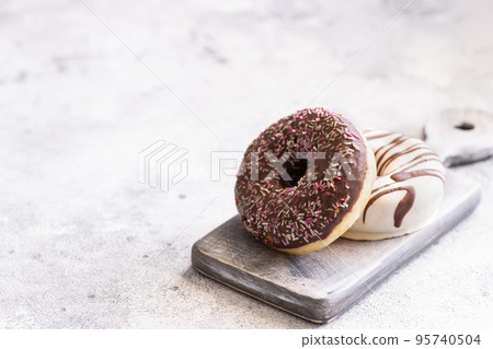 Assortment of various colorful donuts. 95740504