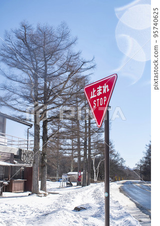 Frozen road the day after it snows Frozen road the day after it snows 95740625