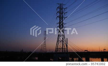 Transmission tower at magic hour 95741002