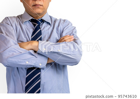 Businessman with arms crossed 95743610