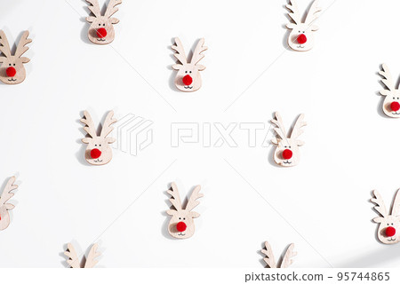 Christmas composition with deer pattern. Top view Christmas composition with deer pattern. Top view 95744865