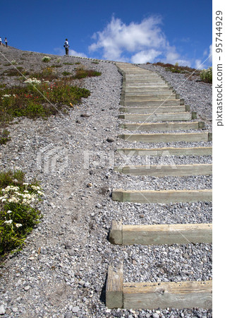Stairs to the mountain and blue sky Stairs to the mountain and blue sky 95744929
