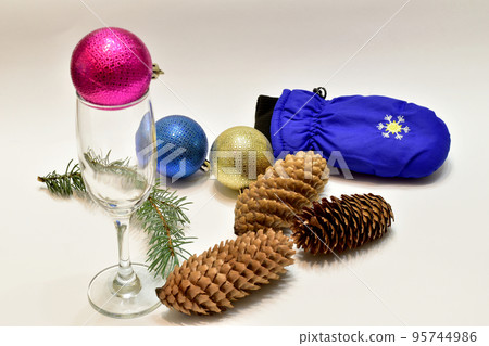 Glass balls decoration for the Christmas tree, wine glass and fir cones. 95744986