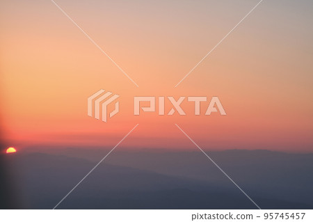 a Twisted cloud formation in an orange sky 95745457