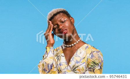 Black transgender person suffering from headache 95746431