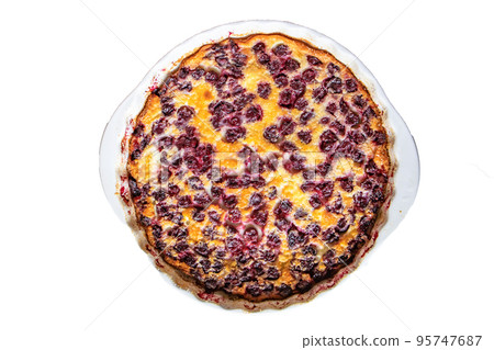 White round ceramic baking dish with freshly baked cherry pie CLAFUTI, top view. isolated on a white background 95747687