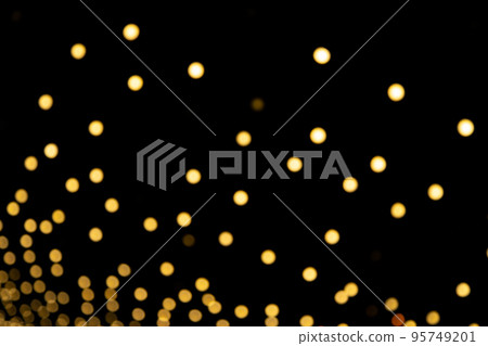 Gold abstract christmas bokeh on black background Gold abstract christmas bokeh on black background 95749201
