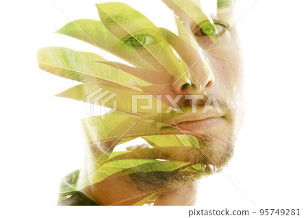 Double exposure portrait of a young man 95749281