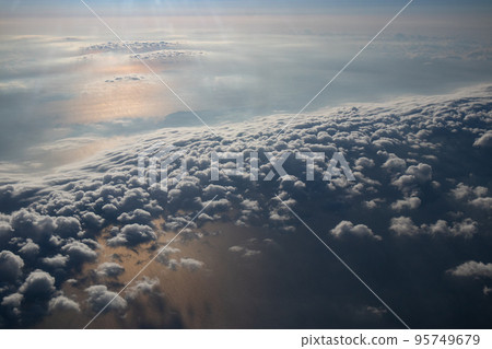 Autumn clouds seen from an airplane Autumn clouds seen from an airplane 95749679