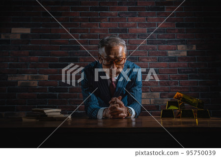 Senior man in suit with financial products 95750039
