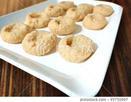 North Indian sweets known as peda or pera made from milk and sugar North Indian sweets known as peda or pera made from milk and sugar 95750897