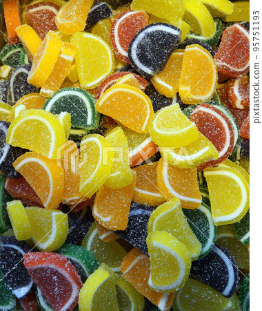 Background of marmalade in the form of orange and lemon slices 95751193