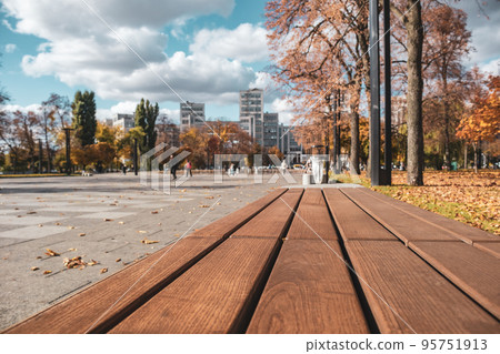 Bench in autumn recreation area in Kharkiv Ukraine Bench in autumn recreation area in Kharkiv Ukraine 95751913