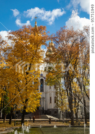 Myrrh-bearing church and fountain, autumn city Myrrh-bearing church and fountain, autumn city 95751949
