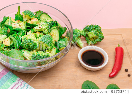 Fresh Green Salad of Avocado, Broccoli, Spinach and Cucumber Fresh Green Salad of Avocado, Broccoli, Spinach and Cucumber 95753744