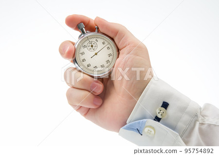 hand with a mechanical stopwatch on a white background hand with a mechanical stopwatch on a white background 95754892