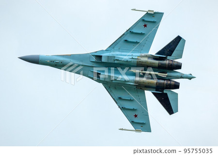 Russian Air Force plane Sukhoi Su-35 flies in sky, Russia 95755035
