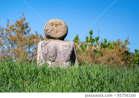 Gods idol statue. Statue on the background of nature. Gods idol statue. Statue on the background of nature. 95756100