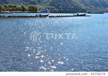 Lake Towada in autumn, view from the sightseeing boat Lake Towada in autumn, view from the sightseeing boat 95756279