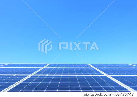 Solar panels lined up under a clear blue sky 95756748