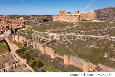 Berlanga de Duero medieval castle ruin near Soria, in the Castilla Leon region Spain with blue sky from air 95757760