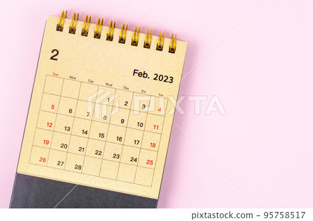 The February 2023 Monthly desk calendar for 2023 year made from craft paper on beautiful background. 95758517