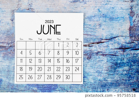 The June 2023 Monthly calendar for 2023 year on old blue wooden background. 95758518