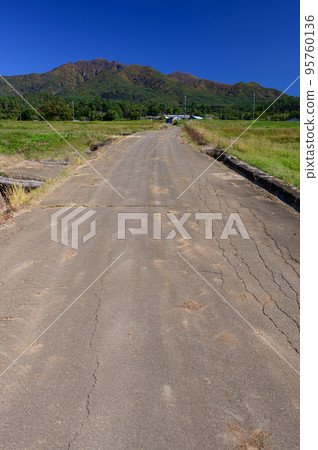 Blue sky and Akeno town farm road 95760136