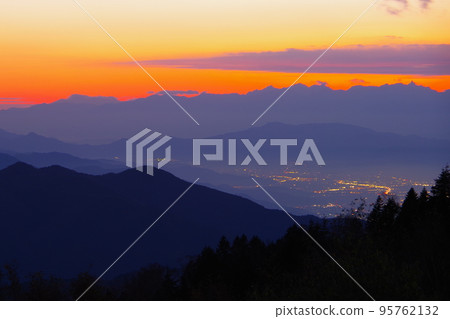 Northern Alps and Nagano Basin at dusk seen from Mt. Yakebitai in Yamanouchi Town, Nagano Prefecture Northern Alps and Nagano Basin at dusk seen from Mt. Yakebitai in Yamanouchi Town, Nagano Prefecture 95762132