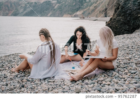 Woman holding her own sea beach scenery - Stock Photo [95762287] - PIXTA