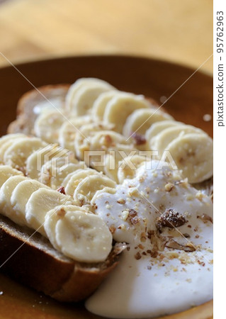 Banana and nut dessert bread, rye bread open sandwich 95762963