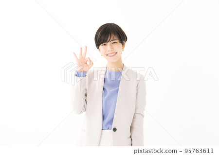 A woman who poses an OK 95763611