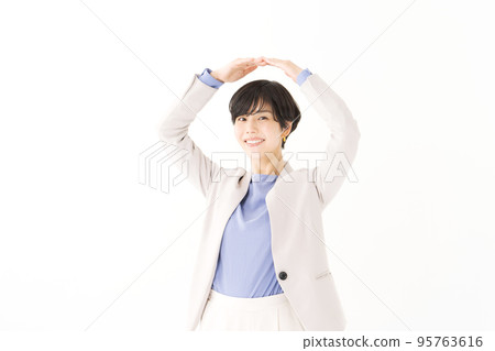 A woman who poses an OK 95763616