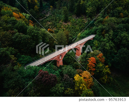 Railway viaduct in Srebrna gora at autumn season. Poland landmark for tourists. Beautiful nature landscape 95763913