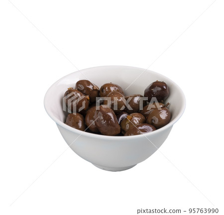 black olives in a white bowl black olives in a white bowl 95763990