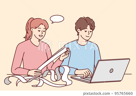 Couple pay bills online on computer  95765660