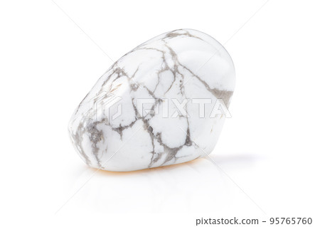 Magnesite or Howlite Mineral Gem Stone on White 95765760