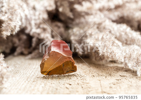 Red and Orange Flint Rock Specimen on Wood 95765835