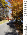 Autumn leaves road around Lake Haruna_Vertical 95768387