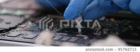 Cpu microchip processor with thermal paste closeup 95768715