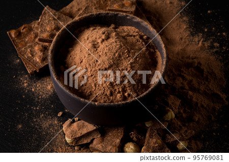 Broken chocolate nuts pieces 95769081