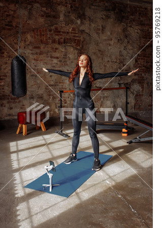 Portrait of a young female online trainer 95769218