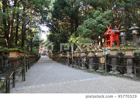 Japanese Shrine: Distant view from Kaguraden at the south gate at the entrance to Kasuga Taisha Shrine in Nara City 95770329