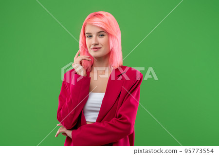 Beautiful stylish girl posing for the camera in a studio 95773554