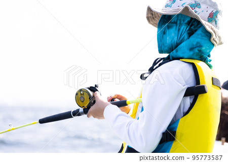 Boys enjoying fishing Boys enjoying fishing 95773587