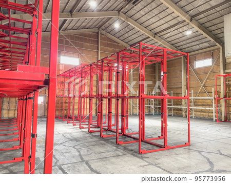 Warehouse with empty storage racks 95773956