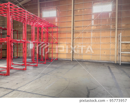 Warehouse with empty storage racks 95773957