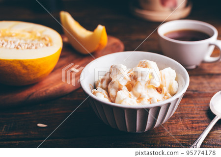 Ice Cream Mixed with Honeydew Melon and Sweet Syrup Ice Cream Mixed with Honeydew Melon and Sweet Syrup 95774178