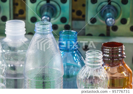 The various type of plastic bottles with injection mold background. 95776731